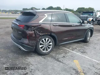 2020 Infiniti QX50 Luxe with VIN 3PCAJ5M10LF119755, listed as a IAAI auction lot 41356089 with 39,243 mi miles and . Bid and sale history available at DreamBid. Image 4.