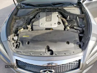 2015 Infiniti Q70 z VIN JN1BY1AR1FM561848, wystawiony jako Copart lot #56432875 z przebiegiem 145 158 mil mil oraz Szkody całkowita. Historia ofert i sprzedaży dostępna na DreamBid. Obrazek 11.