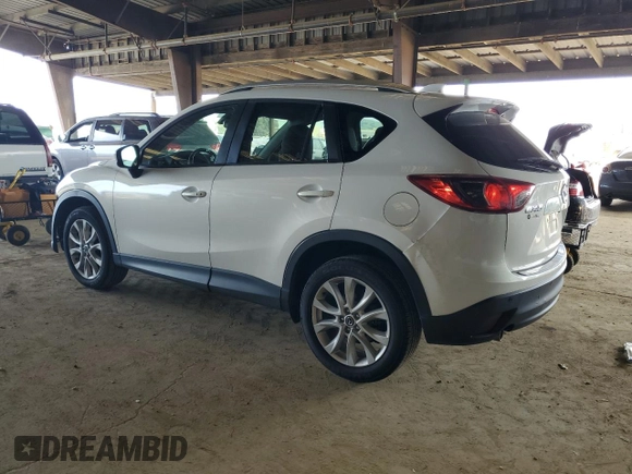 2014 Mazda CX-5 Grand Touring with VIN JM3KE2DY5E0383597, listed as a Copart auction lot 50205545 with 110,052 mi miles and Salvage Title. Bid and sale history available at carsss.com. Image 2.