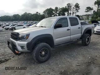 2012 Toyota Tacoma PreRunner z VIN 3TMJU4GN4CM129720, wystawiony jako Copart lot #59079385 z przebiegiem 169 278 mil mil oraz Szkoda całkowita • Salvage title. Historia ofert i sprzedaży dostępna na DreamBid. Obrazek 1.