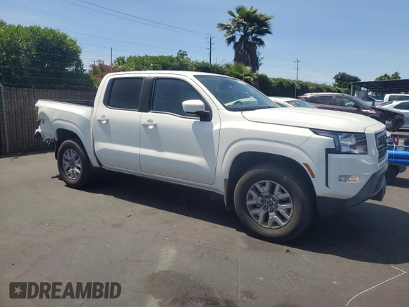 2022 Nissan Frontier Pro-4X with VIN 1N6ED1EKXNN674402, listed as a Copart auction lot 57417245 with 13,986 mi miles and Salvage title. Bid and sale history available at DreamBid. Image 4.