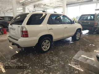 2004 Acura MDX Touring Pkg with VIN 2HNYD18694H548080, listed as a IAAI auction lot 41639820 with 155,466 mi miles. Bid and sale history available at carsss.com. Image 4.