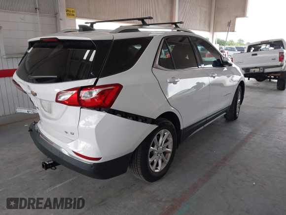 2018 Chevrolet Equinox LT z VIN 3GNAXJEV2JL285919, wystawiony jako IAAI lot #42417524 z przebiegiem 79 402 mil mil oraz . Historia ofert i sprzedaży dostępna na DreamBid. Obrazek 4.