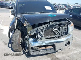 2012 Nissan Titan SV with VIN 1N6AA0EKXCN325898, listed as a IAAI auction lot 42234685 with 102,259 mi miles and . Bid and sale history available at DreamBid. Image 6.