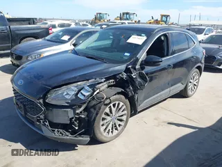 2020 Ford Escape Titanium Hybrid with VIN 1FMCU0DZ9LUC08090, listed as a IAAI auction lot 41674697 with 43,586 mi miles and . Bid and sale history available at DreamBid. Image 2.