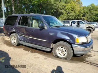 2000 Ford Expedition XLT with VIN 1FMRU15L7YLA86398, listed as a Copart auction lot 75015834 with 203,915 mi miles and Salvage Title. Bid and sale history available at carsss.com. Image 4.