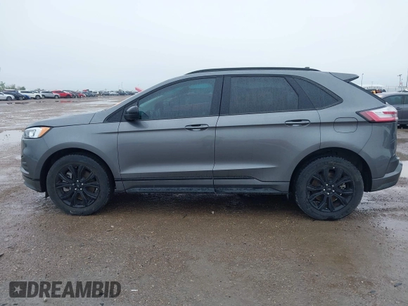 2023 Ford Edge SE z VIN 2FMPK4G95PBA41278, wystawiony jako IAAI lot #41964995 z przebiegiem 21 079 mil mil oraz . Historia ofert i sprzedaży dostępna na DreamBid. Obrazek 14.
