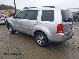 2010 Honda Pilot Touring with VIN 5FNYF3H89AB005861, listed as a IAAI auction lot 40828747 with 275,757 mi miles and . Bid and sale history available at DreamBid. Image 3.