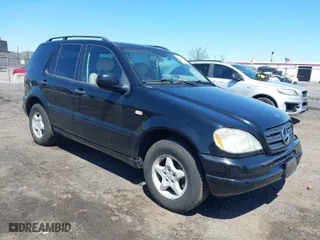 2001 Mercedes-Benz M-Class with VIN 4JGAB54E41A232917, listed as a IAAI auction lot 42055379 with 187,008 mi miles. Bid and sale history available at carsss.com. Image 1.