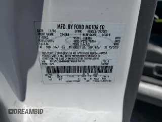 2007 Ford Escape Hybrid with VIN 1FMCU49H87KB61613, listed as a Copart auction lot 58083235 with 129,049 mi miles and Salvage title. Bid and sale history available at DreamBid. Image 14.
