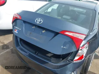 2018 Toyota Corolla L with VIN 2T1BURHE0JC069246, listed as a IAAI auction lot 42164090 with 145,405 mi miles and . Bid and sale history available at DreamBid. Image 17.