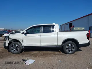 2017 Honda Ridgeline RTL-T z VIN 5FPYK3F69HB038048, wystawiony jako IAAI lot #42583177 z przebiegiem 183 564 mil mil oraz . Historia ofert i sprzedaży dostępna na DreamBid. Obrazek 15.