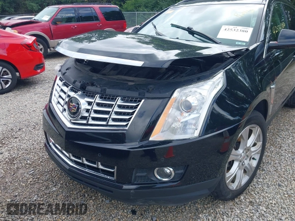 2015 Cadillac SRX Premium Collection z VIN 3GYFNGE36FS626641, wystawiony jako IAAI lot #42532380 z przebiegiem 178 799 mil mil oraz . Historia ofert i sprzedaży dostępna na DreamBid. Obrazek 19.