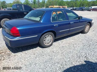 2006 Mercury Grand Marquis LS Premium with VIN 2MEFM75V36X626565, listed as a IAAI auction lot 42007096 with 164,236 mi miles. Bid and sale history available at carsss.com. Image 4.