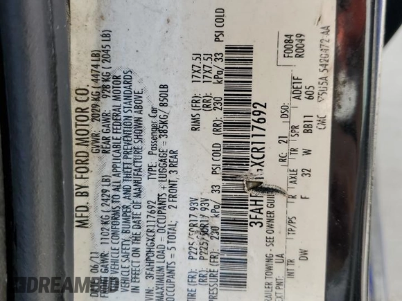 2012 Ford Fusion SE z VIN 3FAHP0HGXCR117692, wystawiony jako Copart lot #56026555 z przebiegiem 236 669 mil mil oraz Szkoda całkowita • Salvage title. Historia ofert i sprzedaży dostępna na DreamBid. Obrazek 12.