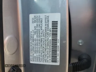 2023 Honda Passport EX-L z VIN 5FNYF8H55PB036004, wystawiony jako Copart lot #59042045 z przebiegiem 9 083 mil mil oraz Szkoda całkowita • Salvage title. Historia ofert i sprzedaży dostępna na DreamBid. Obrazek 13.