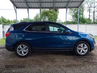 2021 Chevrolet Equinox LT z VIN 3GNAXKEVXML350994, wystawiony jako IAAI lot #42201733 z przebiegiem 31 429 mil mil oraz . Historia ofert i sprzedaży dostępna na DreamBid. Obrazek 13.