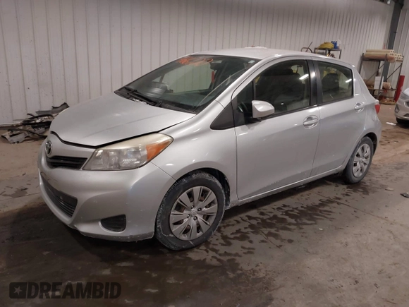 2012 Toyota Yaris L with VIN JTDKTUD34CD523773, listed as a IAAI auction lot 41616220 with 77,332 mi miles. Bid and sale history available at carsss.com. Image 2.