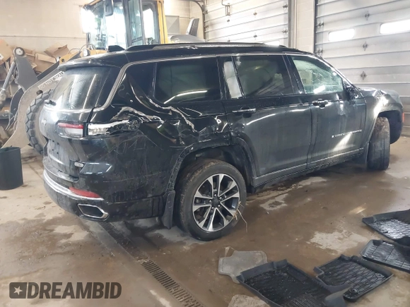 2021 Jeep Grand Cherokee Overland with VIN 1C4RJKDG8M8164904, listed as a IAAI auction lot 41352092 with 57,707 mi miles and . Bid and sale history available at DreamBid. Image 4.