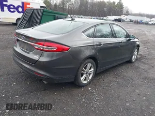 2018 Ford Fusion SE with VIN 3FA6P0HD8JR174211, listed as a IAAI auction lot 41910459 with 83,787 mi miles. Bid and sale history available at carsss.com. Image 4.