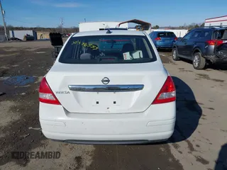 2009 Nissan Versa S with VIN 3N1BC11E19L394465, listed as a IAAI auction lot 41346553 with 159,983 mi miles and . Bid and sale history available at DreamBid. Image 17.