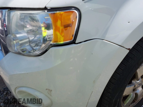 2012 Ford Escape Limited with VIN 1FMCU0E7XCKB71186, listed as a IAAI auction lot 41660455 with 160,863 mi miles. Bid and sale history available at carsss.com. Image 13.