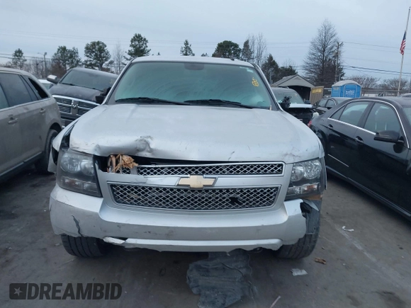 2011 Chevrolet Suburban LS with VIN 1GNSCHE07BR241468, listed as a IAAI auction lot 41376362 with 277,907 mi miles. Bid and sale history available at carsss.com. Image 12.
