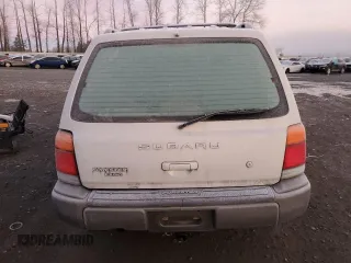 1999 Subaru Forester S with VIN JF1SF6555XH703271, listed as a Copart auction lot 84328434 with 208,023 mi miles and Salvage Title. Bid and sale history available at carsss.com. Image 6.