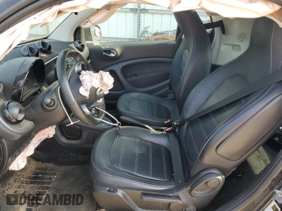 2016 Smart fortwo Passion с VIN WMEFJ5DA7GK066701, выставлен на аукционе Copart как лот 59093055 с пробегом 84 417 миль миль и Списание • Salvage title. История ставок и продаж доступна на DreamBid. Изображение 7.