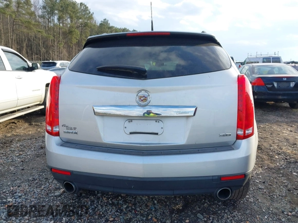 2014 Cadillac SRX with VIN 3GYFNAE39ES688059, listed as a IAAI auction lot 41408062 with 192,770 mi miles and . Bid and sale history available at DreamBid. Image 16.