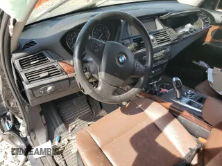 2012 BMW X5 35i with VIN 5UXZV4C54CL985119, listed as a Copart auction lot 56856735 with Not provided miles and Salvage title. Bid and sale history available at DreamBid. Image 8.