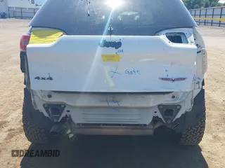 2014 Jeep Cherokee Trailhawk with VIN 1C4PJMBSXEW236807, listed as a IAAI auction lot 42660980 with 157,225 mi miles and . Bid and sale history available at DreamBid. Image 6.