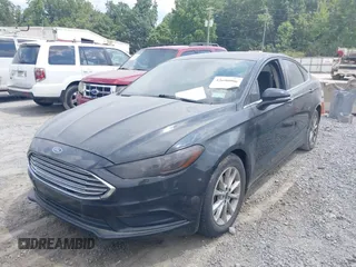 2017 Ford Fusion SE with VIN 3FA6P0HD0HR351408, listed as a IAAI auction lot 42690906 with 148,273 mi miles and . Bid and sale history available at DreamBid. Image 2.