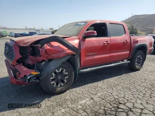 2023 Toyota Tacoma SR with VIN 3TYCZ5AN0PT125926, listed as a Copart auction lot 58581775 with 26,702 mi miles and Salvage title. Bid and sale history available at DreamBid. Image 1.