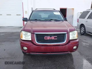 2003 GMC Envoy SLT with VIN 1GKDS13S132118361, listed as a IAAI auction lot 41909425 with 283,342 mi miles. Bid and sale history available at carsss.com. Image 6.