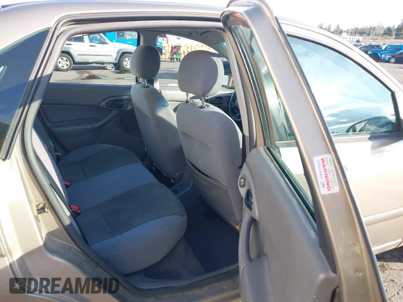 2004 Ford Focus SE with VIN 1FAFP34354W167961, listed as a IAAI auction lot 41545304 with 128,560 mi miles and . Bid and sale history available at DreamBid. Image 8.