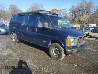 2001 GMC Savana z VIN 1GJHG39R711122618, wystawiony jako Copart lot #80872634 z przebiegiem Nie podano mil oraz Szkoda całkowita • Salvage title. Historia ofert i sprzedaży dostępna na DreamBid. Obrazek 4.