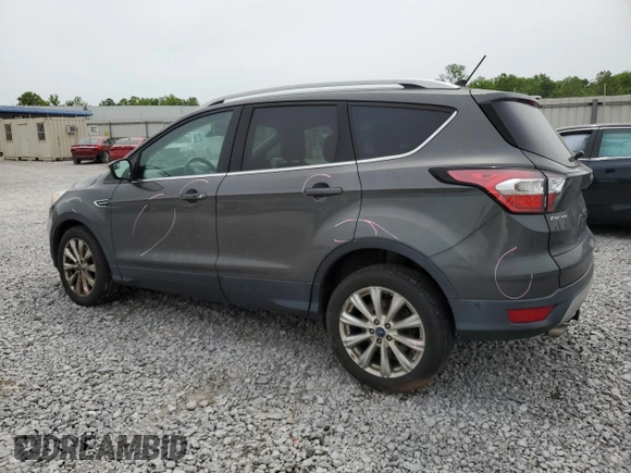 2018 Ford Escape Titanium with VIN 1FMCU9J97JUB34691, listed as a Copart auction lot 56404625 with 107,037 mi miles and Salvage title. Bid and sale history available at DreamBid. Image 2.