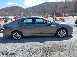 2022 Toyota Camry LE with VIN 4T1C11AK2NU054251, listed as a IAAI auction lot 41880293 with 48,559 mi miles. Bid and sale history available at carsss.com. Image 13.