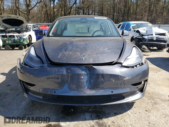 2022 Tesla Model 3 with VIN 5YJ3E1EA5NF339769, listed as a Copart auction lot 47111685 with 44,087 mi miles and Salvage Title. Bid and sale history available at DreamBid. Image 5.