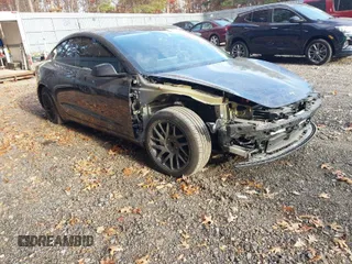 2024 Tesla Model 3 with VIN 5YJ3E1EA0RF750468, listed as a IAAI auction lot 40716321 with 12,360 mi miles. Bid and sale history available at carsss.com. Image 1.