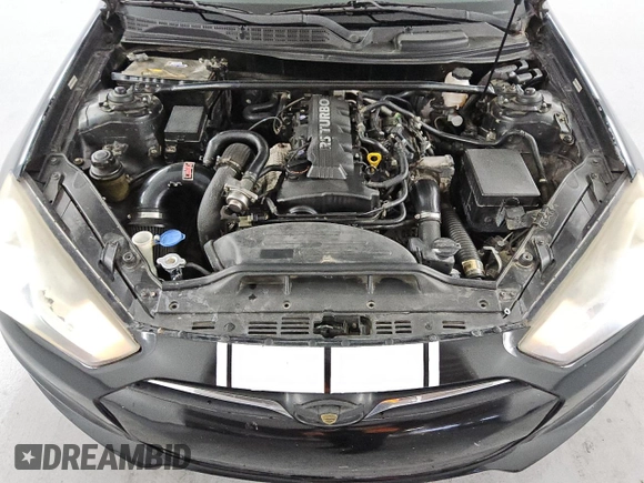 2013 Hyundai Genesis Coupe 2.0T z VIN KMHHT6KD1DU081937, wystawiony jako Copart lot #61016905 z przebiegiem 99 943 mil mil oraz Szkoda całkowita • Salvage title. Historia ofert i sprzedaży dostępna na DreamBid. Obrazek 11.