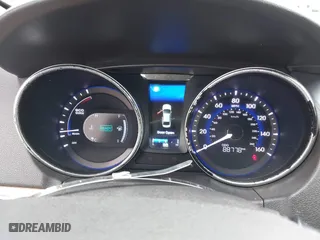 2015 Hyundai Sonata Hybrid Limited with VIN KMHEC4A44FA132151, listed as a IAAI auction lot 41497863 with 88,778 mi miles. Bid and sale history available at carsss.com. Image 7.