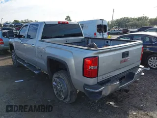 2015 GMC Sierra 2500HD available WiFi SLT with VIN 1GT12ZEG7FF167096, listed as a IAAI auction lot 41408317 with 152,969 mi miles. Bid and sale history available at carsss.com. Image 3.