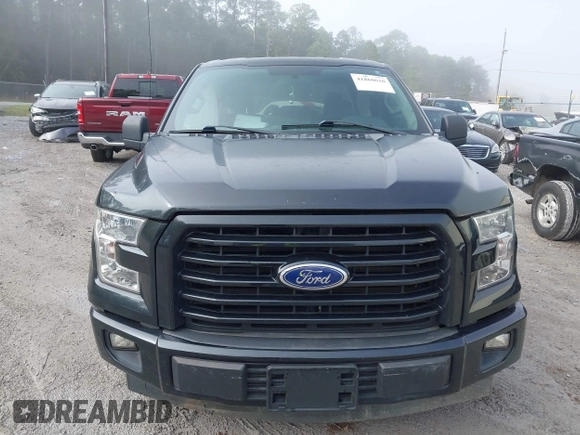 2015 Ford F-150 XL with VIN 1FTEX1CF2FKD12874, listed as a IAAI auction lot 41860610 with 242,215 mi miles. Bid and sale history available at carsss.com. Image 13.