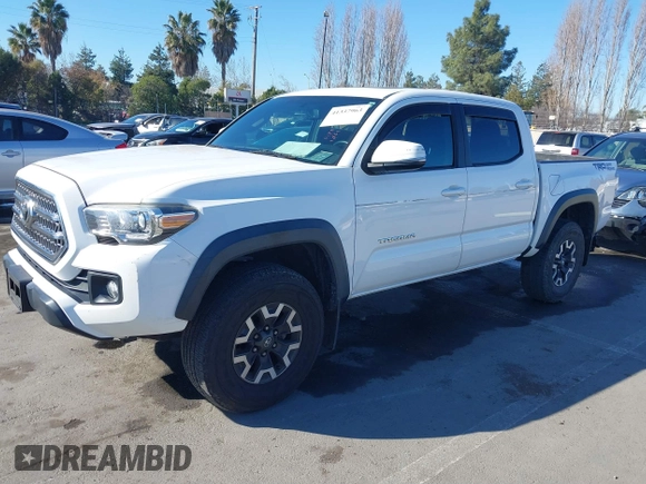 2016 Toyota Tacoma SR5 z VIN 3TMAZ5CN5GM014661, wystawiony jako IAAI lot #41337963 z przebiegiem 26 175 mil mil oraz . Historia ofert i sprzedaży dostępna na DreamBid. Obrazek 18.