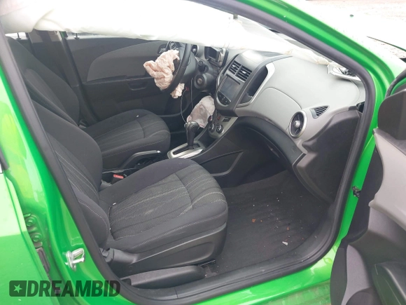 2015 Chevrolet Sonic LT with VIN 1G1JC5SB8F4168860, listed as a IAAI auction lot 42163278 with 102,855 mi miles and . Bid and sale history available at DreamBid. Image 5.