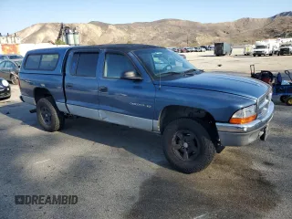2001 Dodge Dakota with VIN 1B7HL2AX71S339829, listed as a Copart auction lot 44539825 with 183,961 mi miles and Salvage title. Bid and sale history available at DreamBid. Image 4.