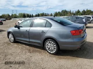 2013 Volkswagen Jetta TDI w/Premium/Nav with VIN 3VWLL7AJ8DM393069, listed as a Copart auction lot 54534955 with 88,212 mi miles and Salvage title. Bid and sale history available at DreamBid. Image 2.