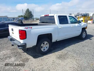 2016 Chevrolet Silverado 1500 LT with VIN 3GCUKREC1GG278916, listed as a IAAI auction lot 41799147 with 123,217 mi miles and . Bid and sale history available at DreamBid. Image 4.